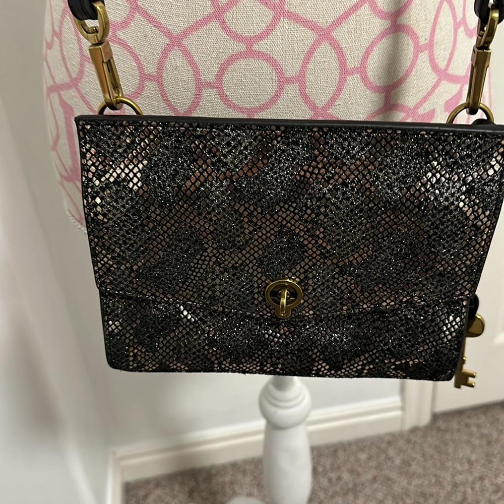 Fossil evening bag 6 1/2 x 8” animal print has key in perfect condition